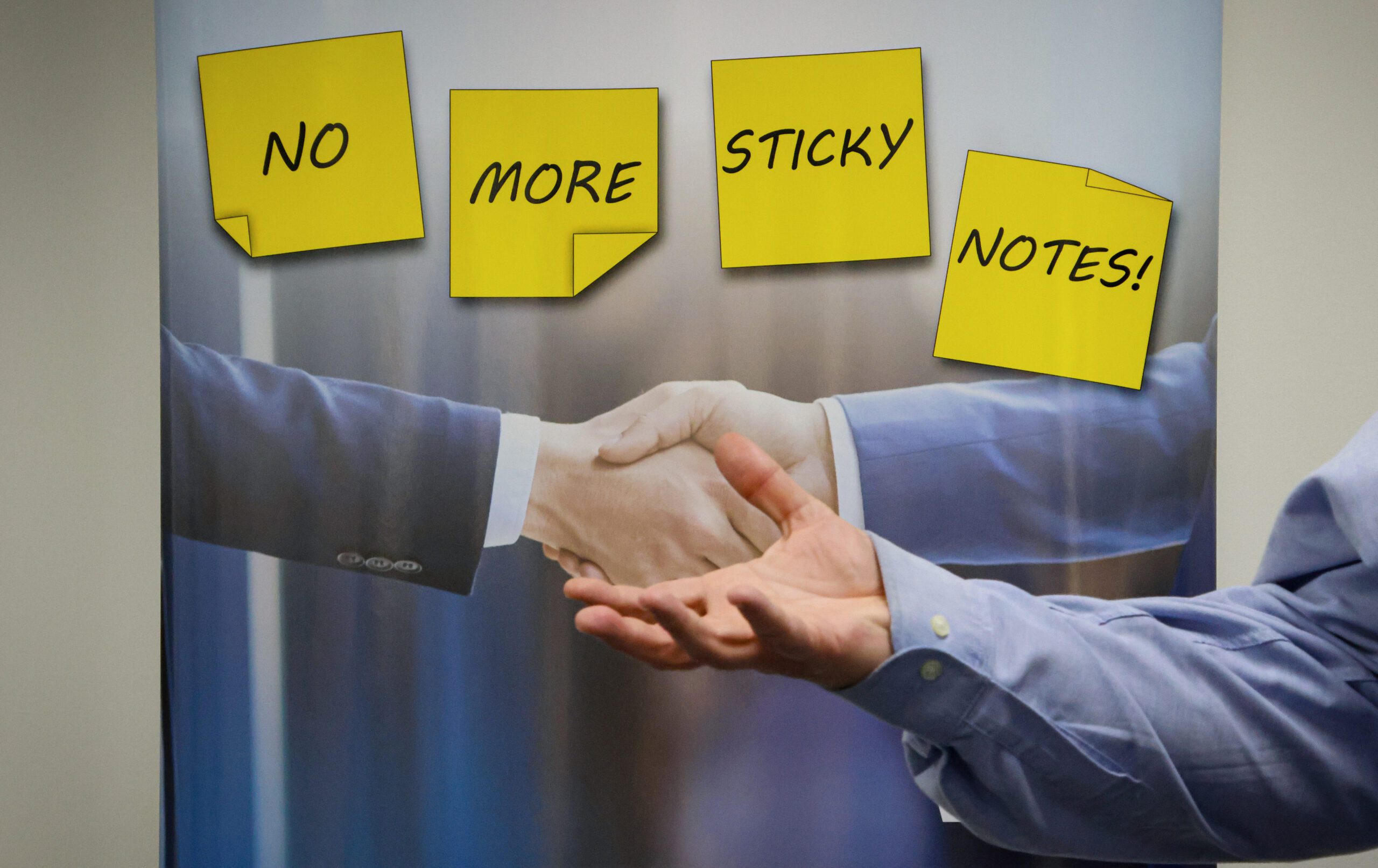 Adam's hand over poster